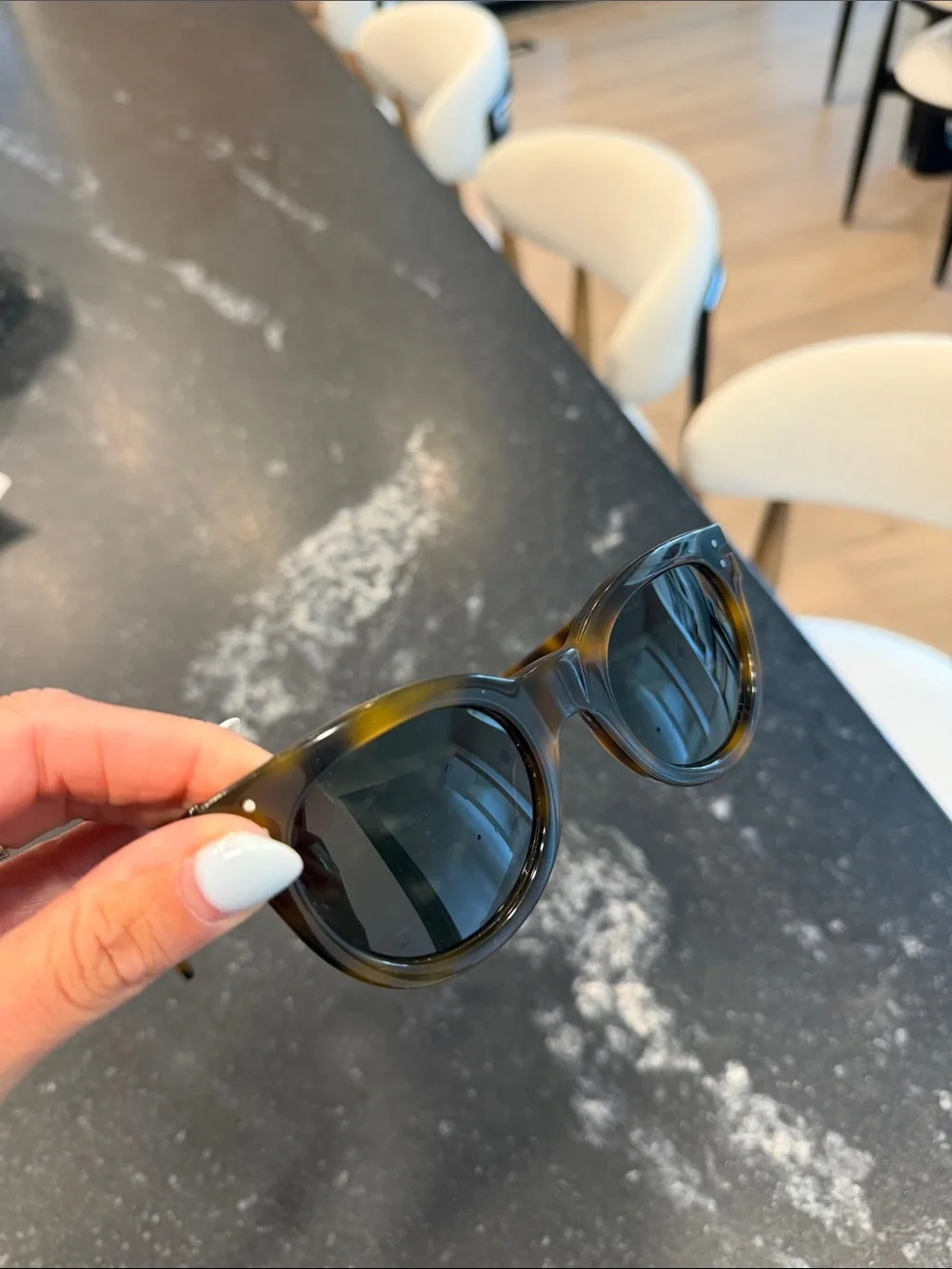 Celine sunglasses featuring